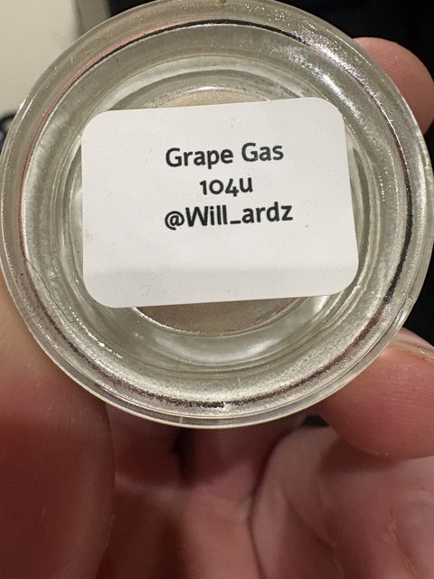 The sticker on the bottom of the jar: Grape Gas, 104u, @Will_ardz